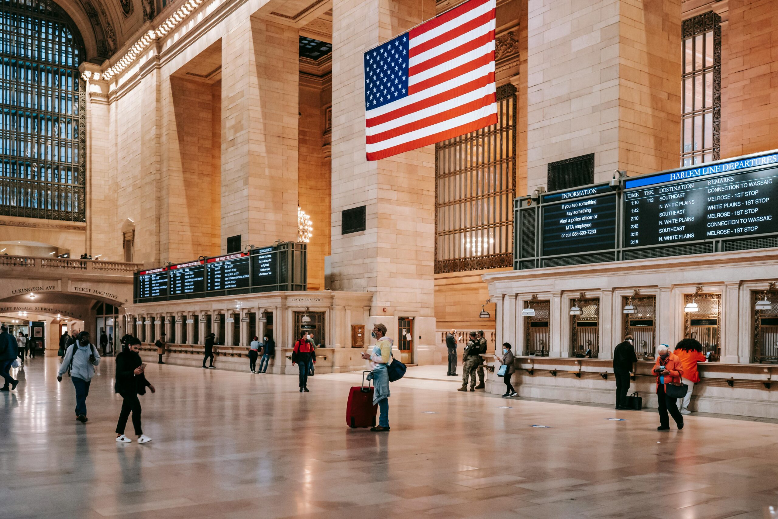 LGA Shuttle Holiday Hours in 2026: Your Ultimate Guide to Seamless NYC Travel 2 Interior of classic Grand Central Terminal building with brick columns and ornamental walls over parquet on floor