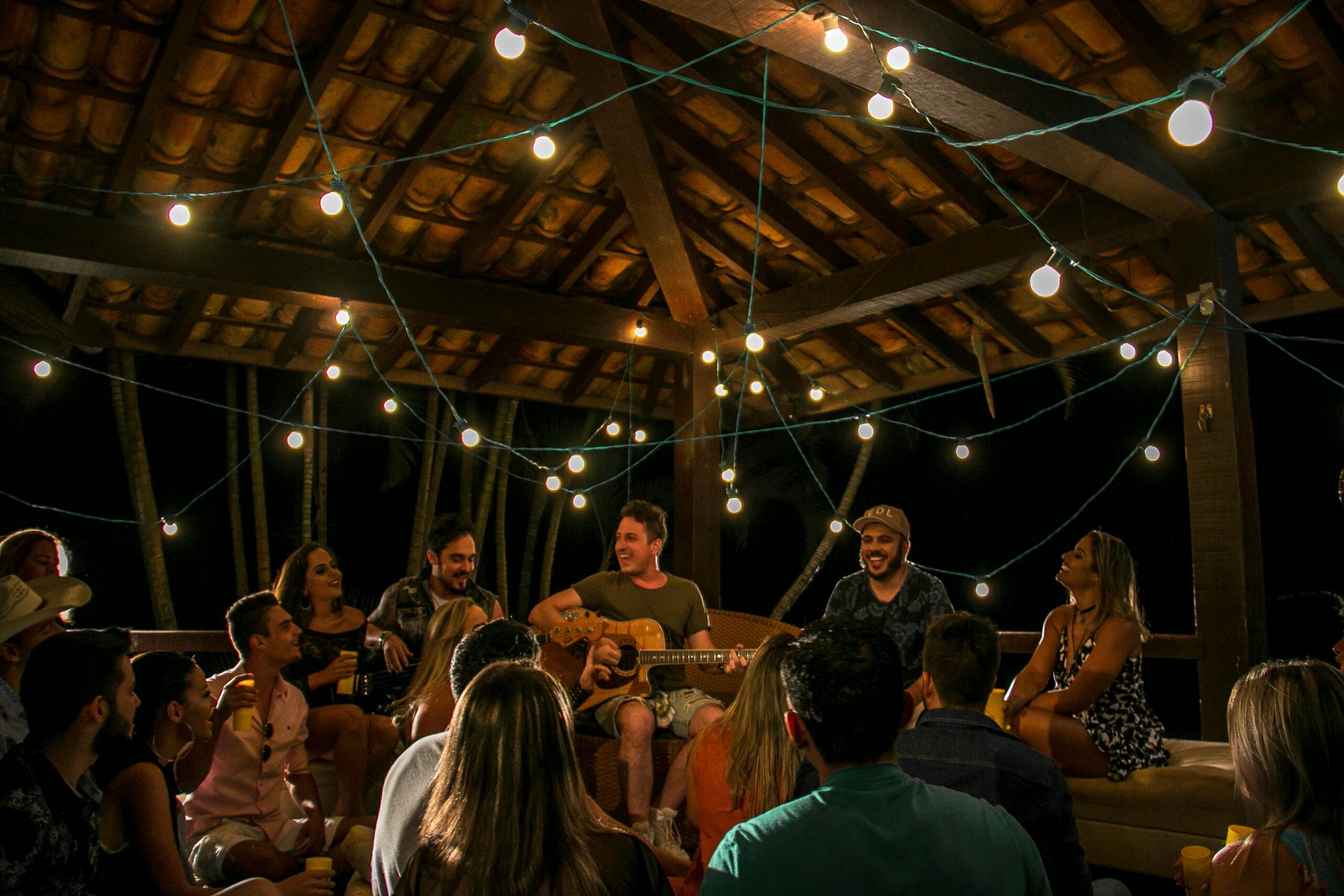 Party Bus Bachelor Parties Brooklyn: Your 2025 Guide to Unforgettable Nights 7 An intimate musical gathering under string lights in São Paulo, Brazil.