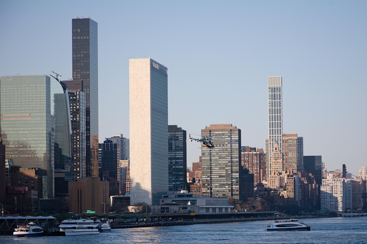 Event Bus Near Me NYC: Your Guide to Renting the Perfect Ride for Any Occasion in 2026 7 nyc, new york, new york city, boats, ferry, nature, ship, east river, architechture, summer, river, waterways, buildings, city, sunny, daytime, city photography, helicopter